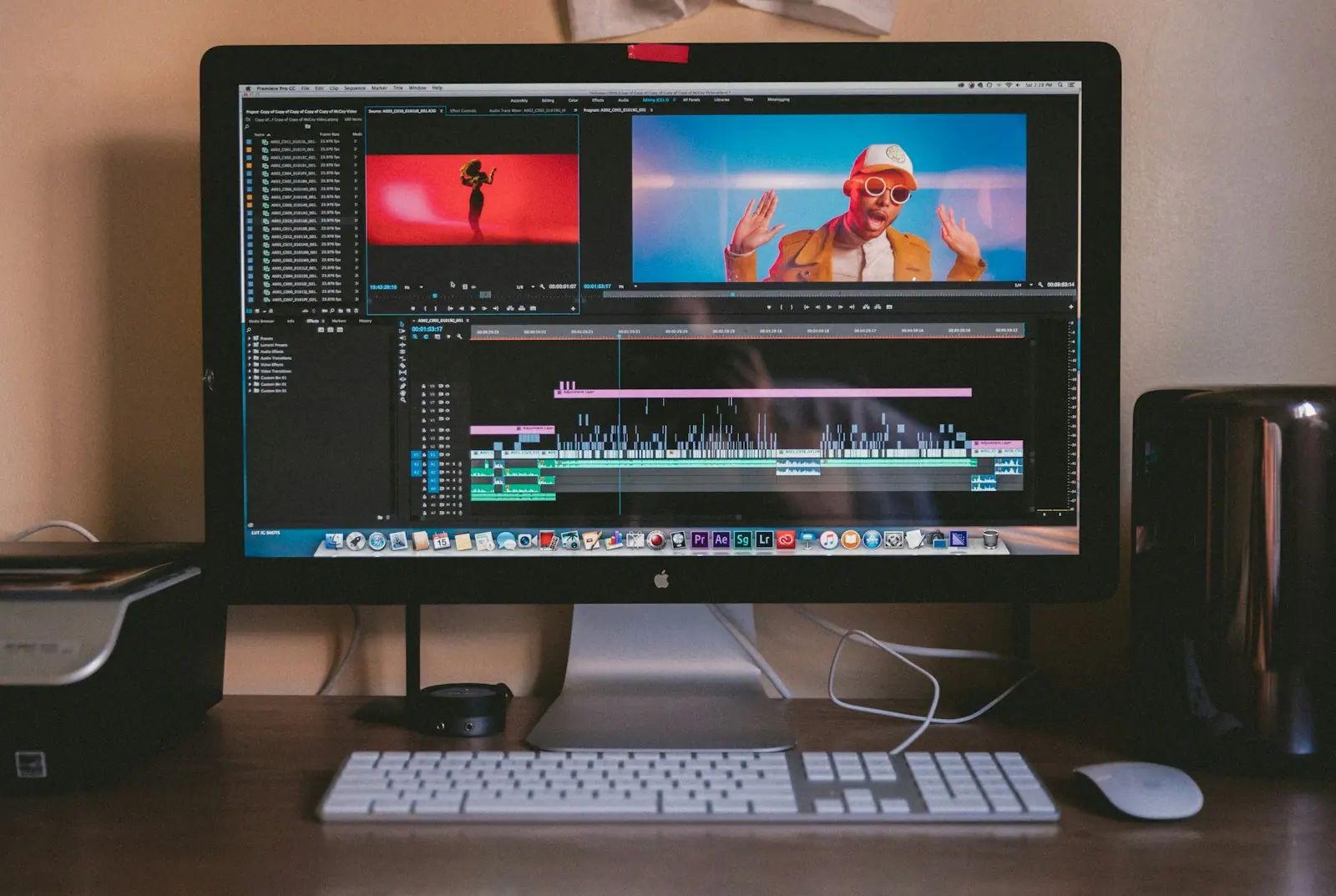 Video editor working with colorful footage in a production studio